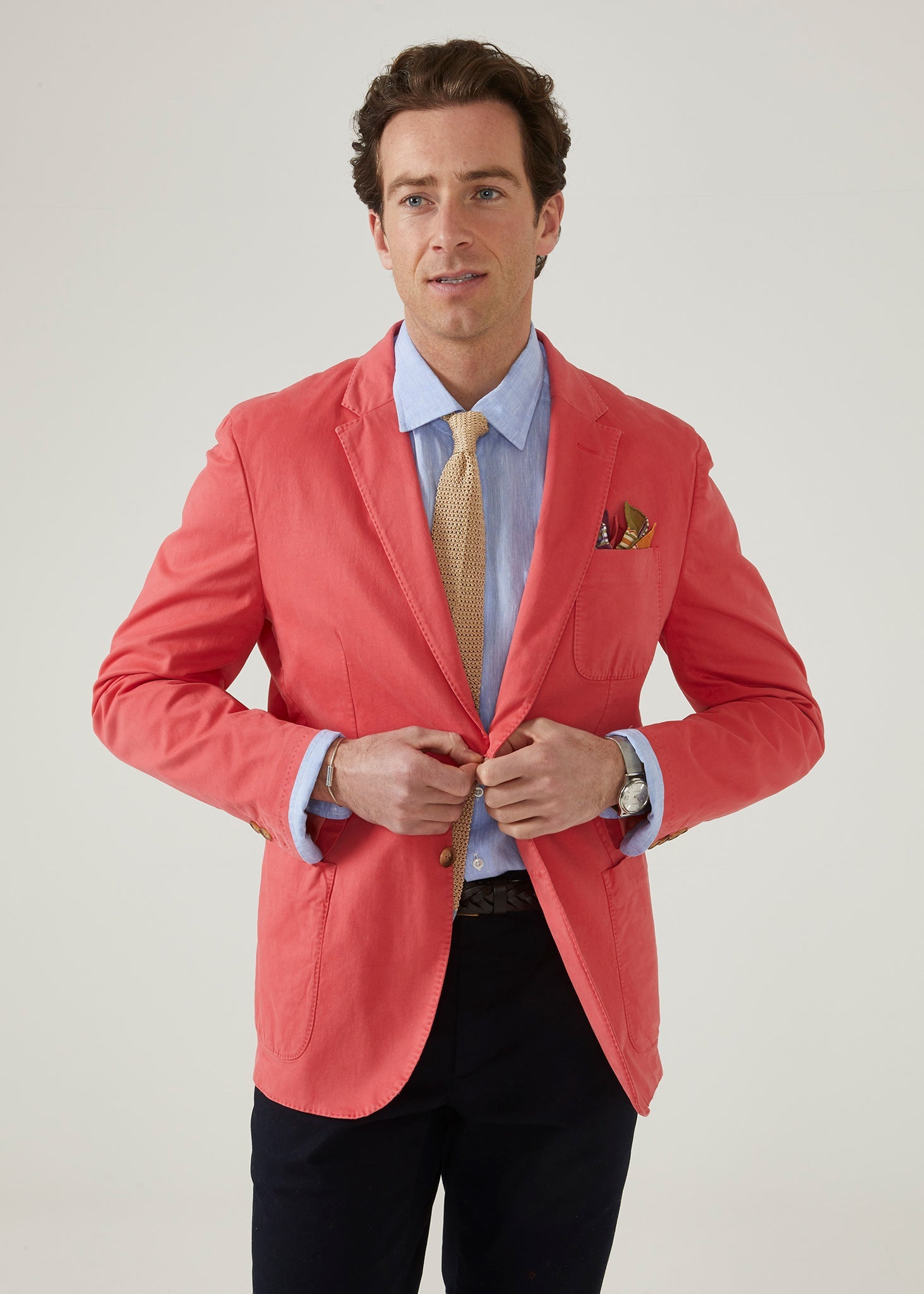 Flamingo pink men's blazer with 2 button fastening.
