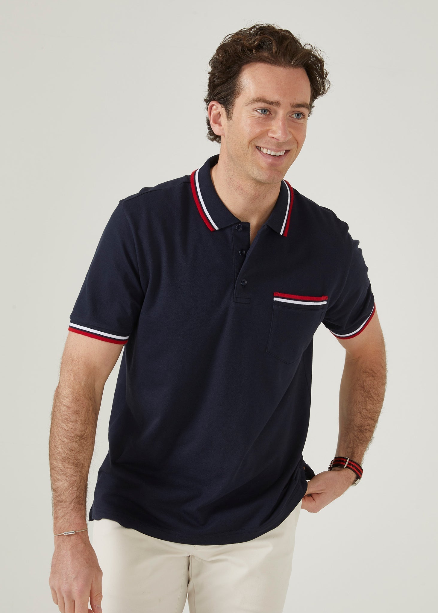 short sleeved pique polo shirt with trim in navy.