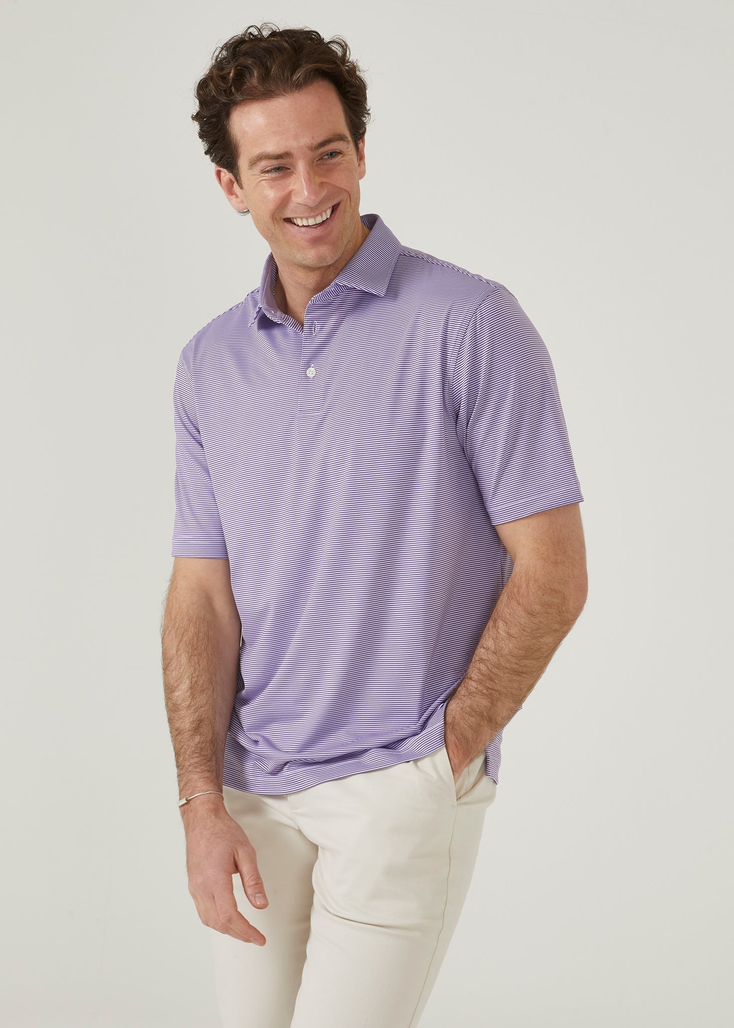 Polo shirt made from polyester with 3 button collar in plum with white stipes.