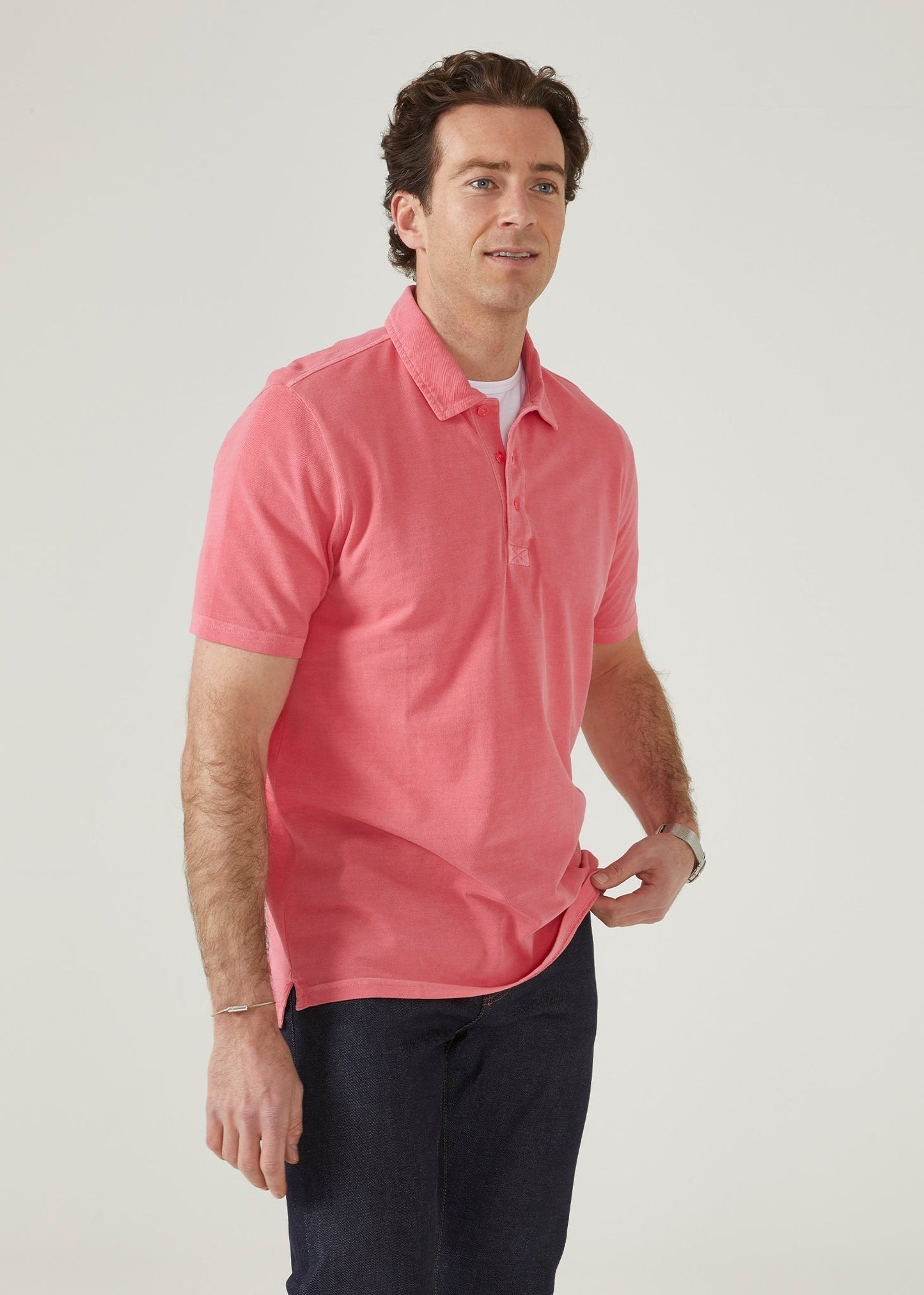calypso pink polo shirt with short sleeves made from 100% preuvian cotton.